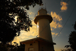 夕日に包まれる古宇利島の灯台